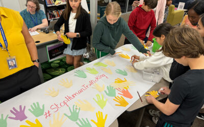 Promoting awareness of human trafficking through primary and secondary connections