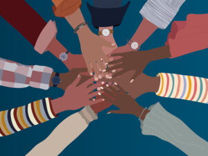 Children’s hands placed together in the centre, symbolising unity