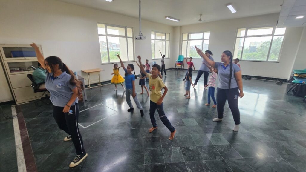 Pathways students teaching music and dance