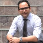 A headshot of Vivek Mukherjee
