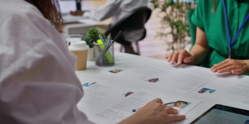 An abstract graphic showing colourful arrows pointing in one direction