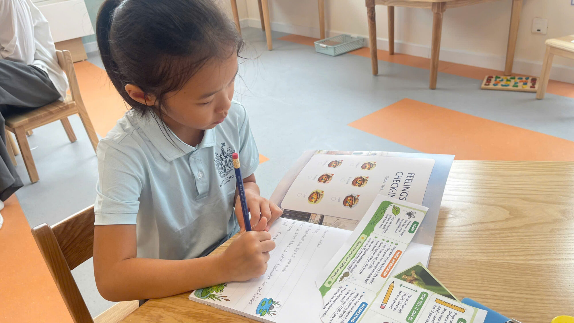 Student completing workbook